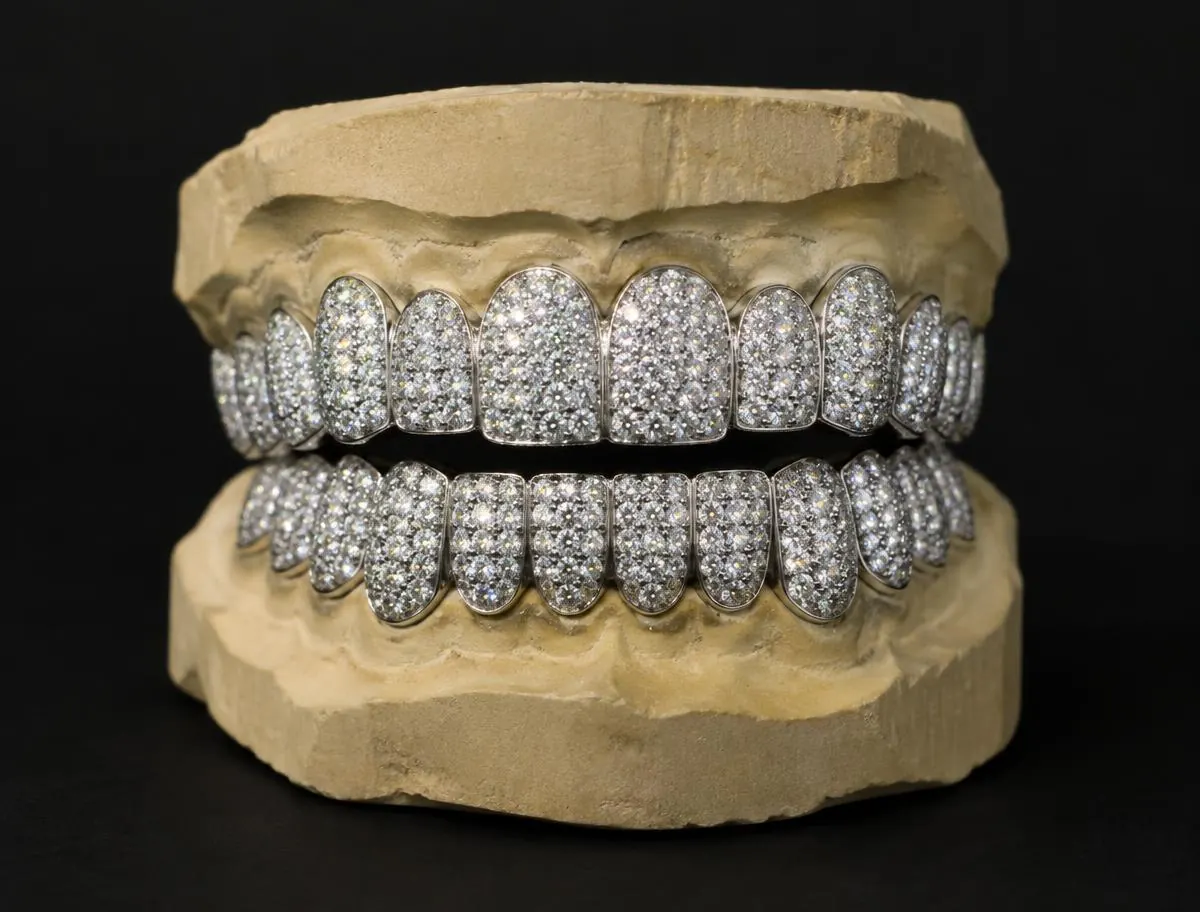 Full top and bottom iced white-gold grillz set with moissanite on a stone mould